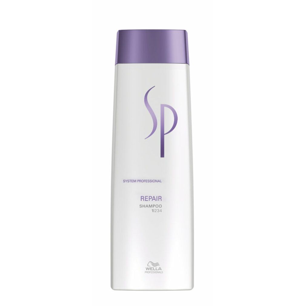 Flacone di shampoo bianco con tappo viola. Logo SP e scritta Repair.