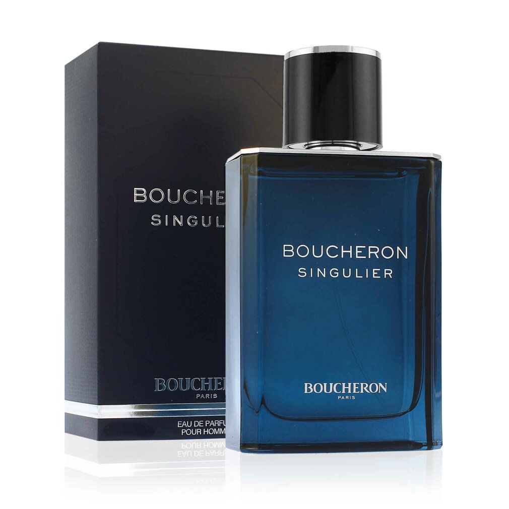 Flacone di profumo blu e scatola. Scritta: Boucheron Singulier. Scatola nera con scritta argentata.