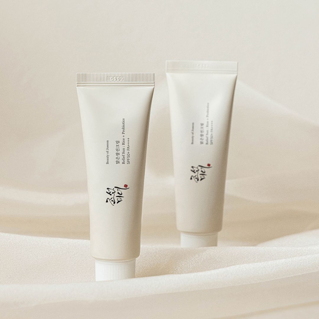 Due tubi di crema affiancati. Scritta: Relief Sun Rice + Probiotics SPF 50+ PA++++.