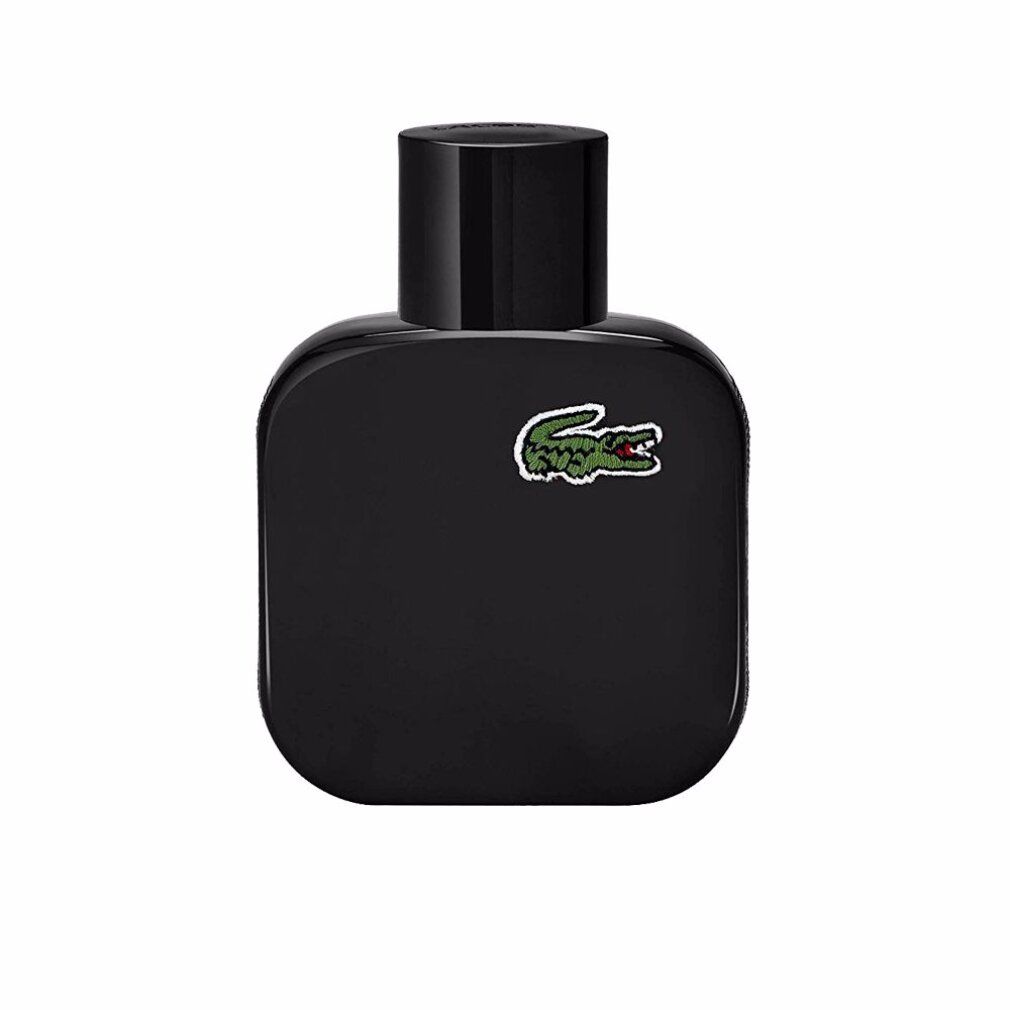 Flacone nero con tappo nero. Logo Lacoste con coccodrillo verde. Forma quadrata.