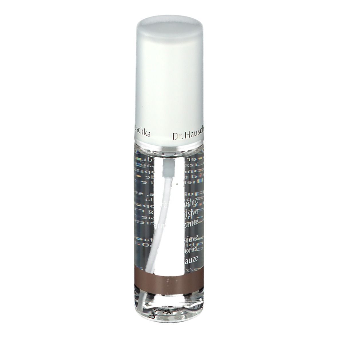 Flacone trasparente con vaporizzatore. Tappo bianco. Nome del prodotto e testo sul flacone. Striscia marrone in basso.