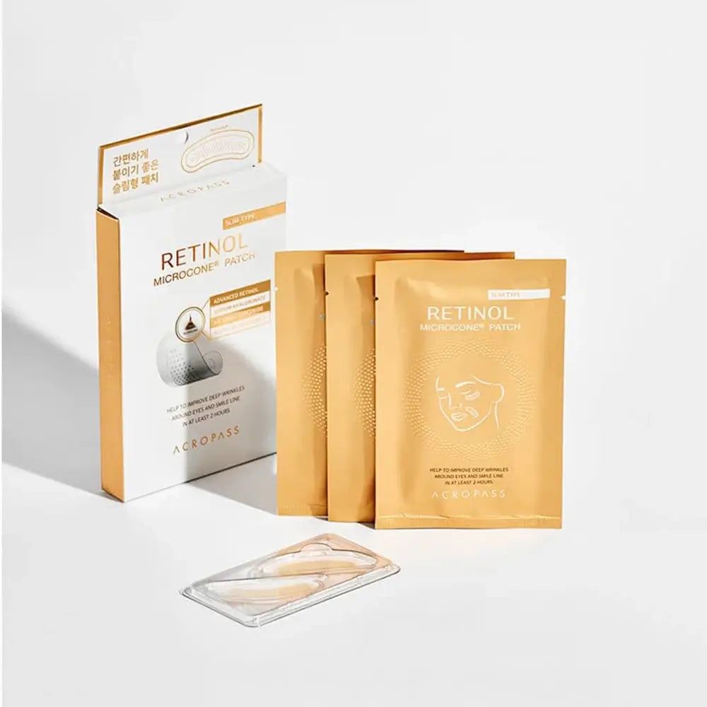 Confezione di cerotti microcono al retinolo. Include bustine singole e una scatola. Scritta: RETINOL MICROCONE PATCH.