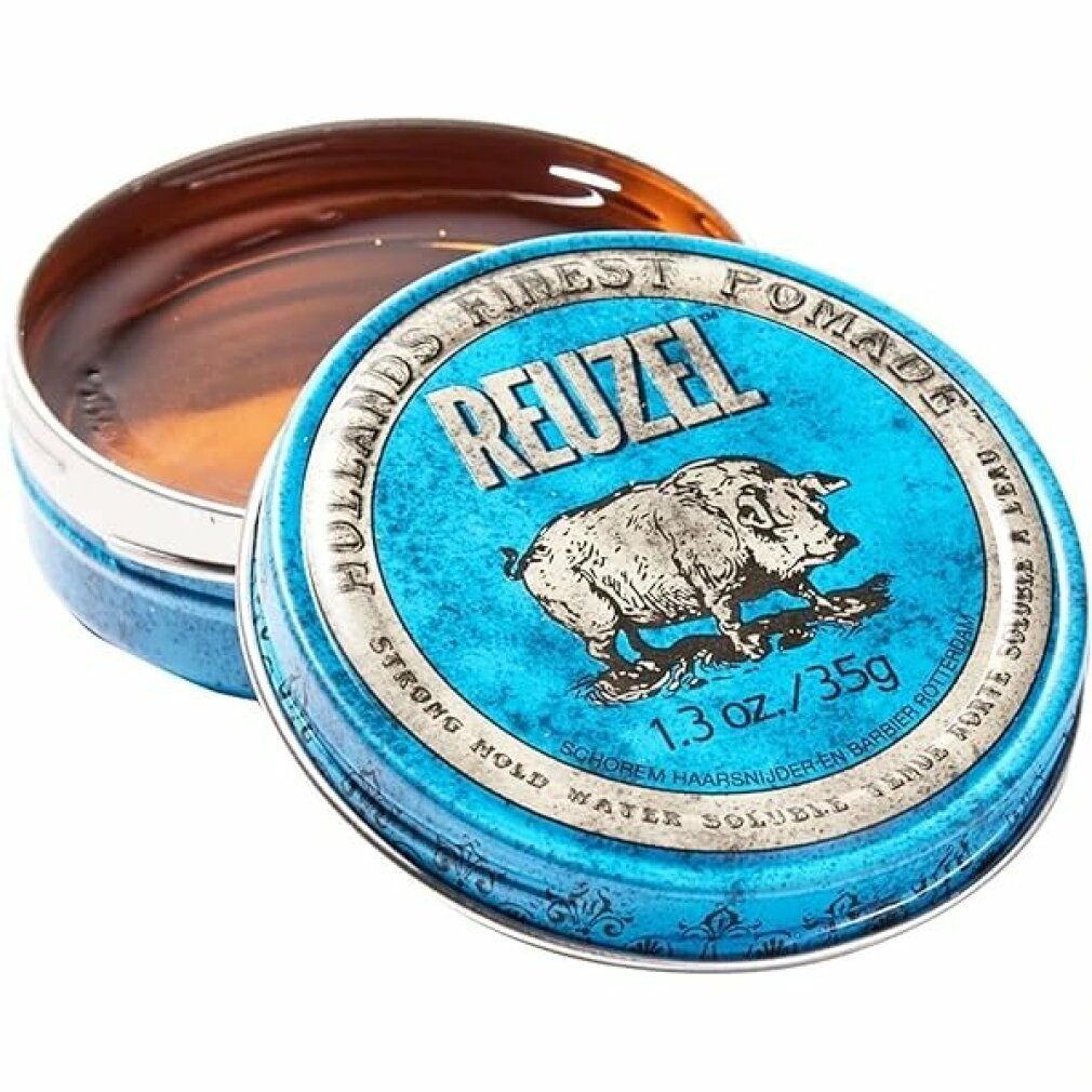 Barattolo blu aperto con bordo argentato. Scritta: Reuzel, Hollans Finest Pomade. Illustrazione di maiale. Contenuto visibile.