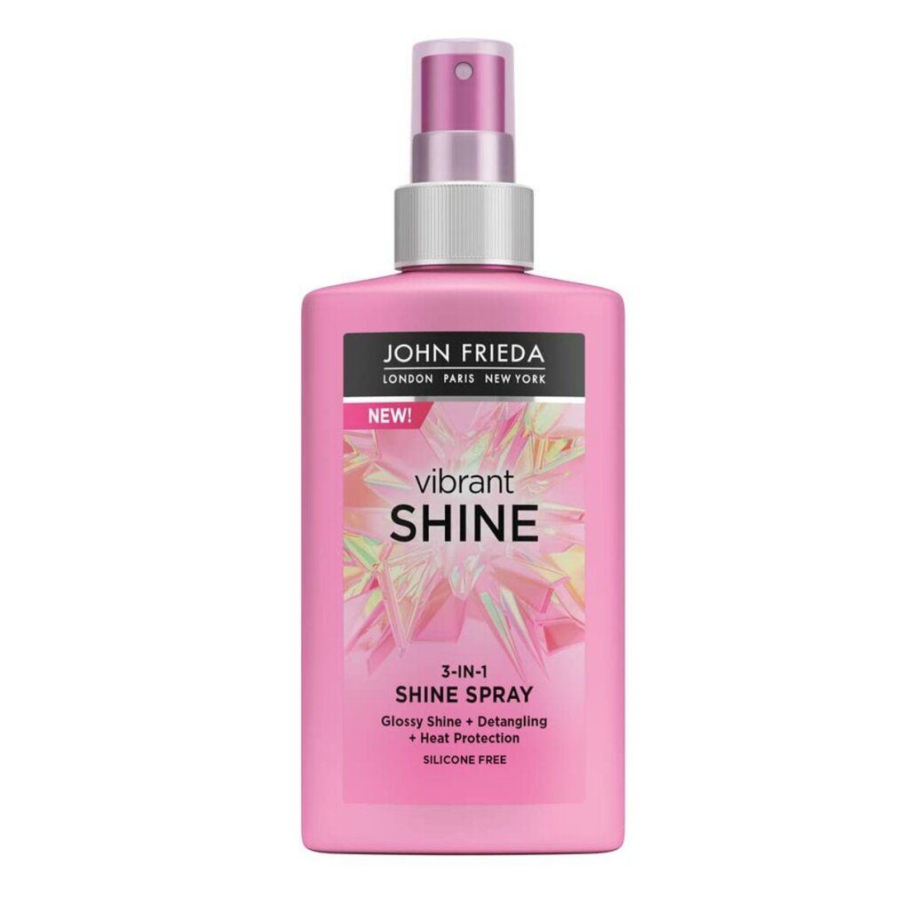 Flacone rosa con vaporizzatore. Scritta: John Frieda, Vibrant Shine, 3-in-1 Shine Spray. Lucentezza, districante, protezione termica. Senza silicone.