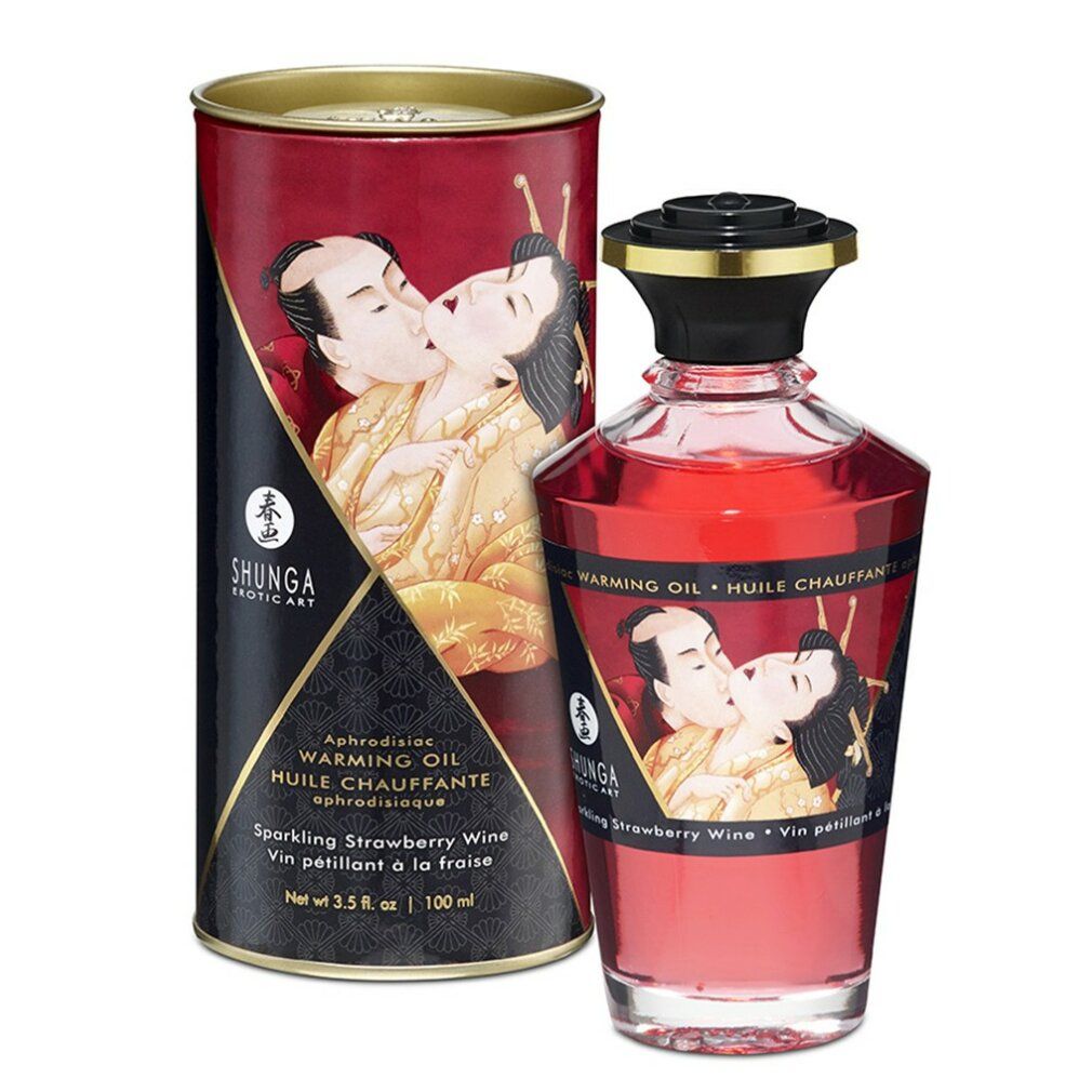Flacone e scatola rossi con etichette. Scritta: Shunga, Olio riscaldante, aroma fragola. Illustrazione di una coppia che si bacia.