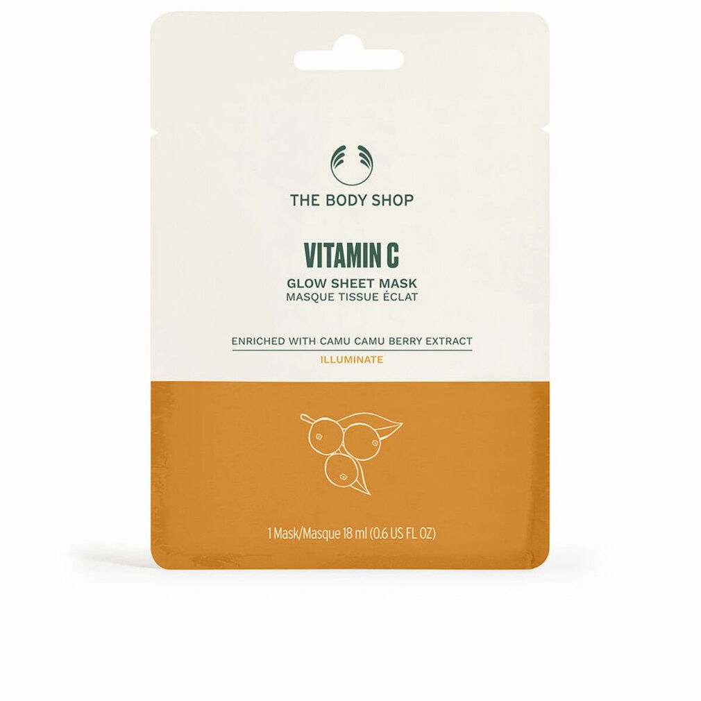 Confezione maschera in tessuto. Parte superiore bianca, inferiore arancione. Testo: The Body Shop, Vitamin C, Glow Sheet Mask, Camu Camu Berry Extract, Illuminate.
