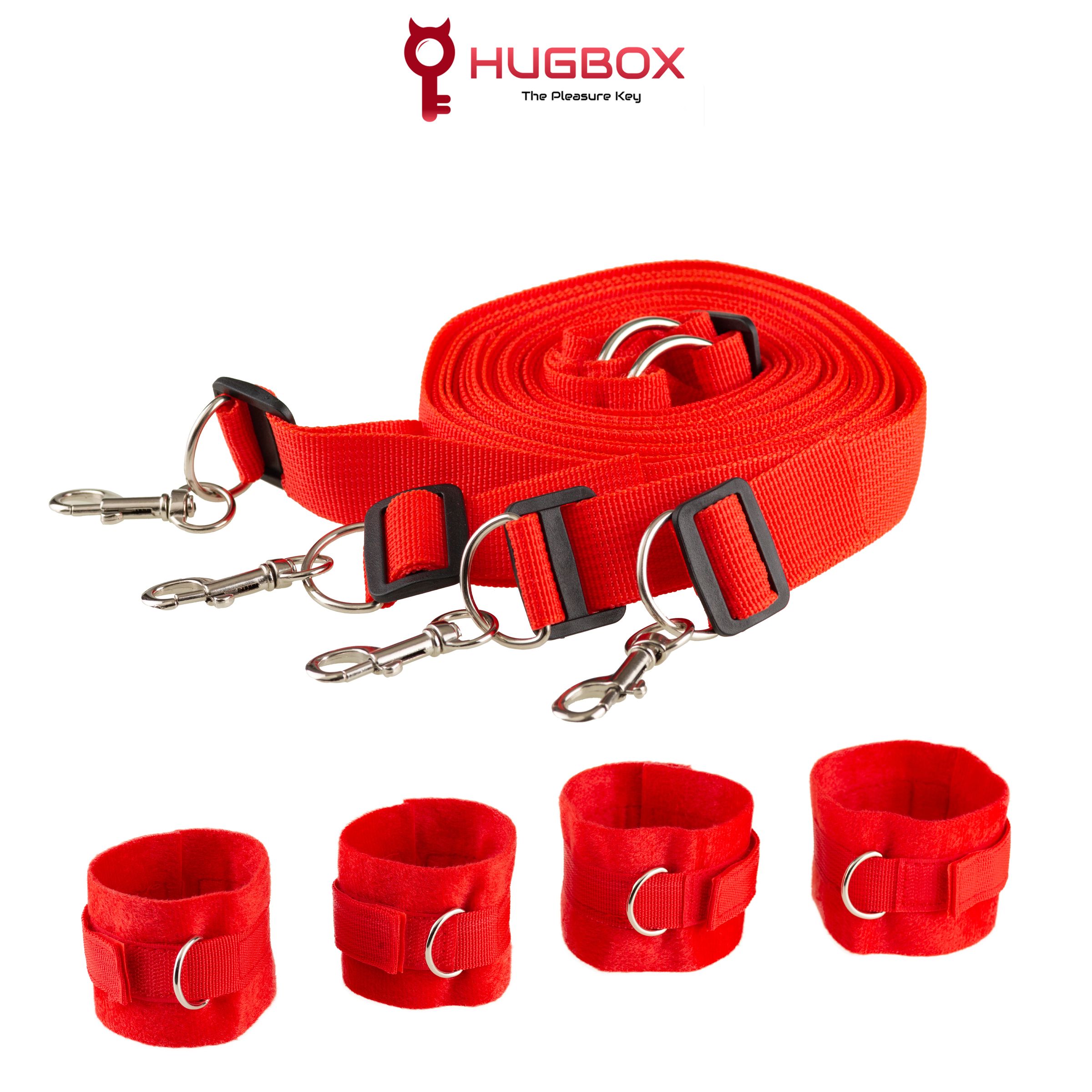 Set rosso con manette e cinghie. Include quattro manette e una lunga cinghia con fibbie.