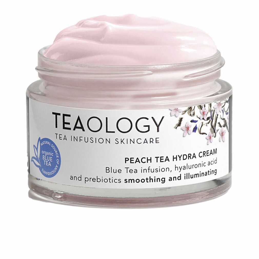 Crema in vasetto di vetro. Scritta: Teaology, Peach Tea Hydra Cream. Crema rosa visibile.
