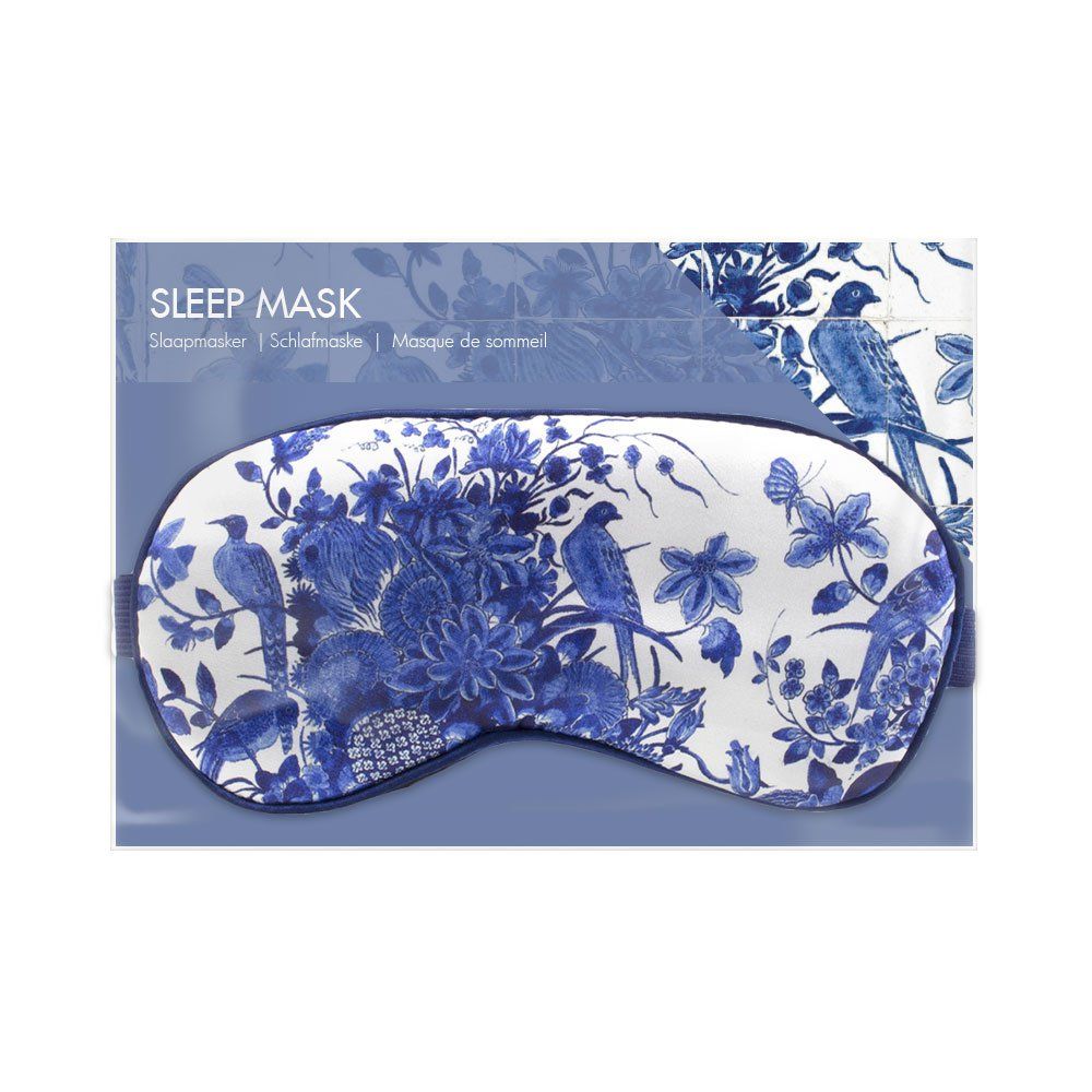 Maschera per dormire nella confezione. Motivo floreale blu e bianco. Testo: Sleep Mask, Schlafmaske, Masque de sommeil.