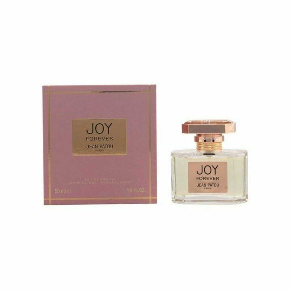 Flacone di profumo e scatola. Scritta: JOY FOREVER JEAN PATOU PARIS. Scatola rosa, testo dorato. Flacone con tappo dorato.