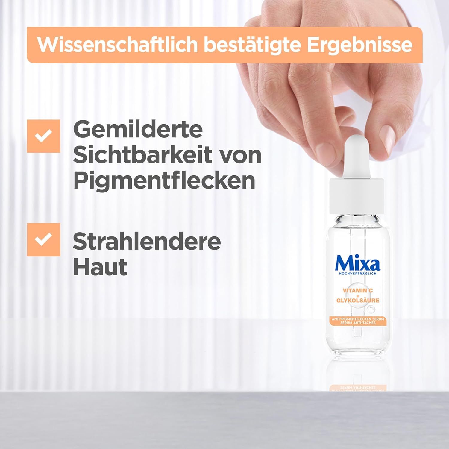 Mano che tiene Mixa Anti-Macchie Siero. Flacone con contagocce. Testo: Riduzione delle macchie pigmentarie, pelle più luminosa.