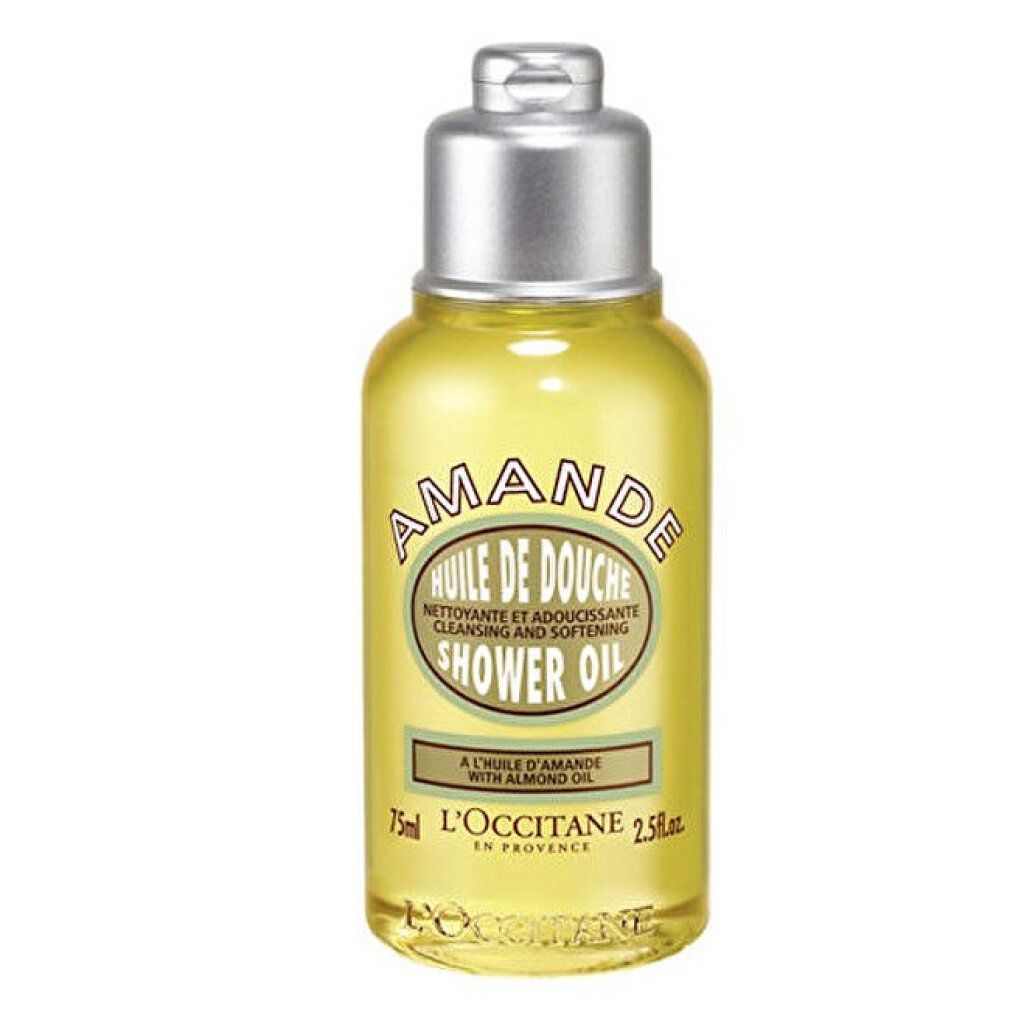 Flacone di gel doccia trasparente con tappo argentato. Scritte: "AMANDE" e "Shower Oil". Marchio: L'Occitane.