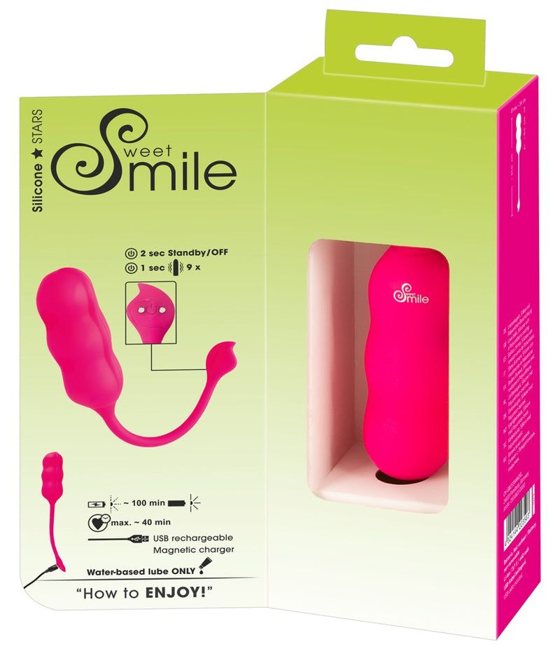 Vaginal trainer rosa in confezione. Stampato: Sweet Smile, informazioni di ricarica, cavo USB.