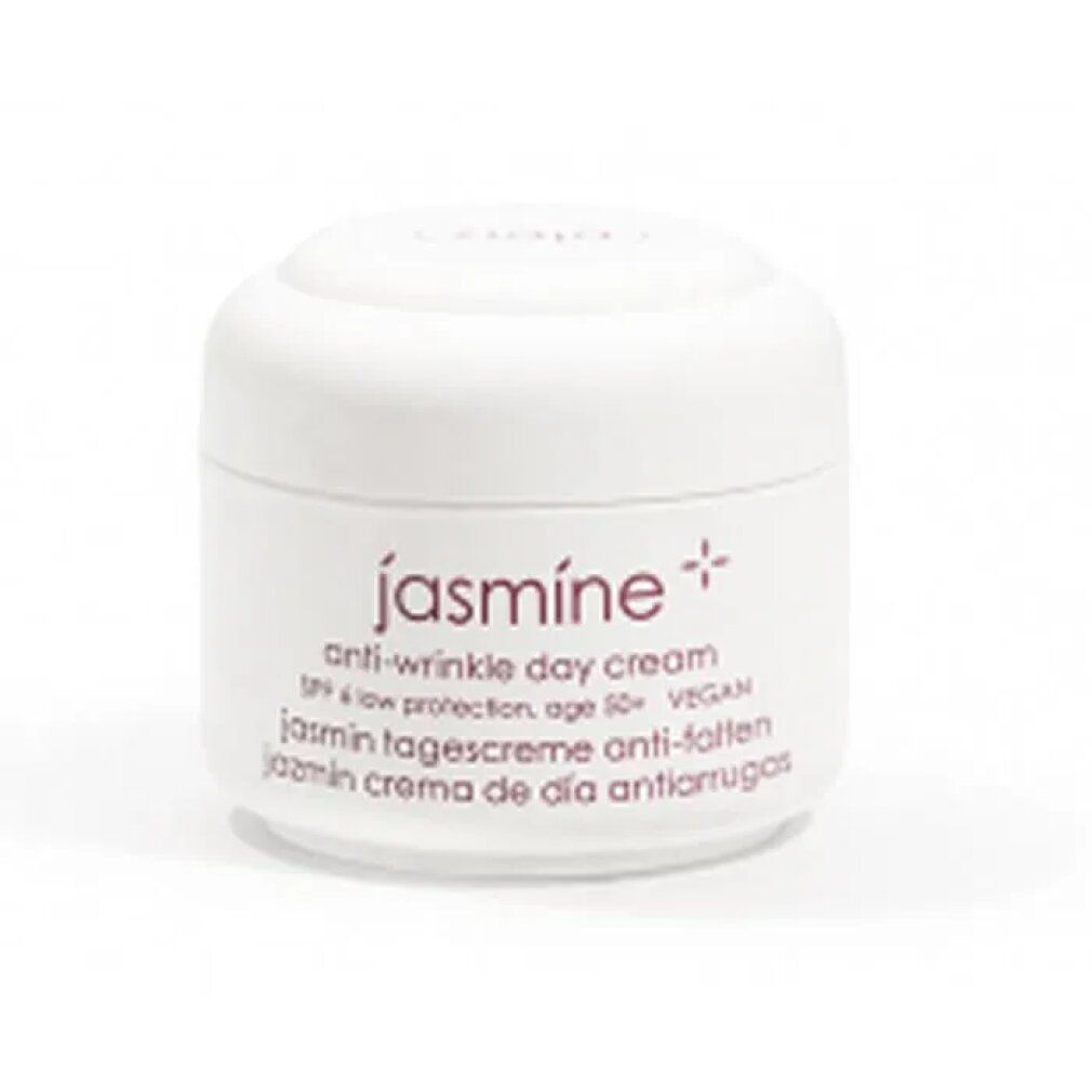 Vasetto bianco con coperchio. Scritta: jasmine, crema giorno antirughe, SPF 6, vegano. Denominazioni multilingue.