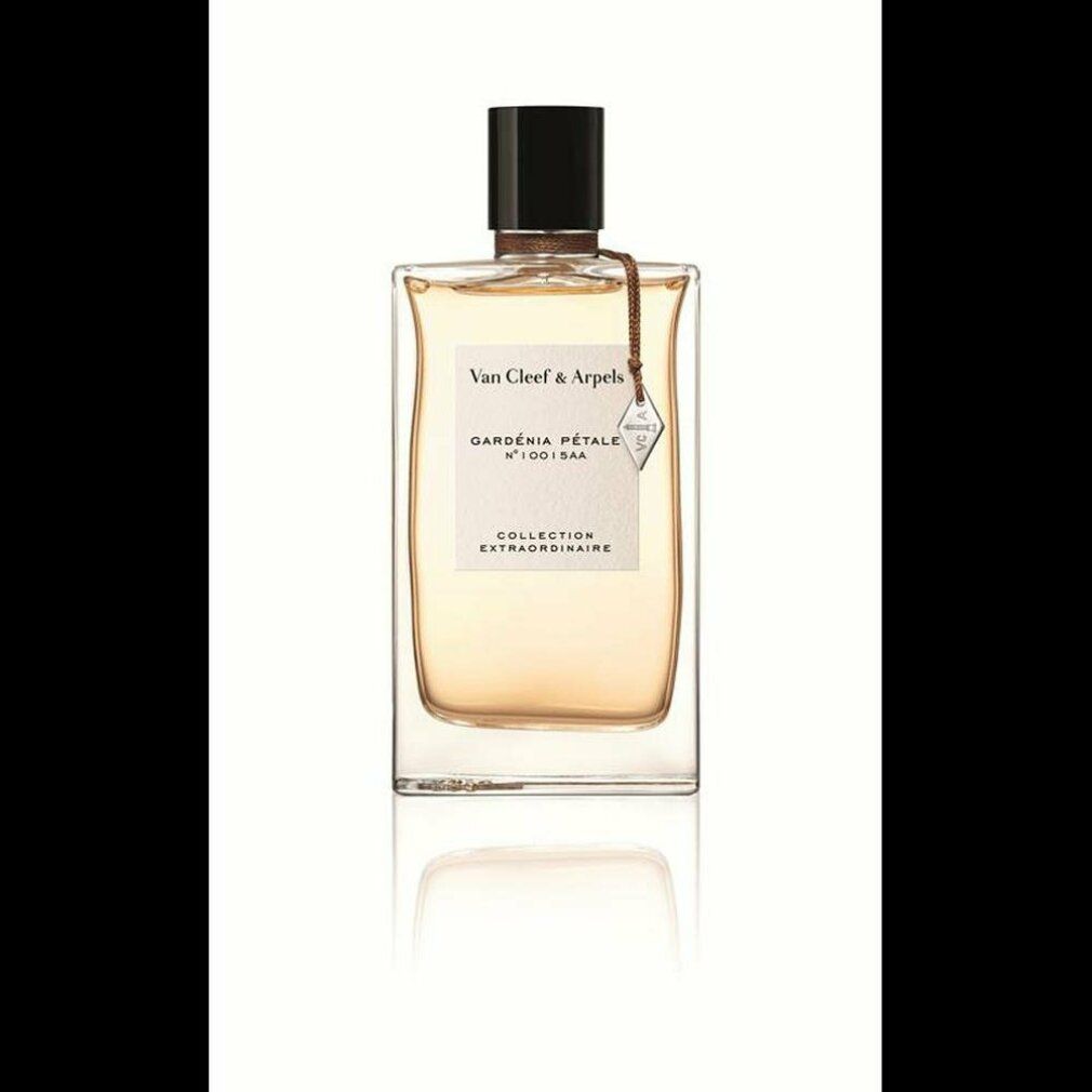 Flacone di profumo rettangolare con nastro marrone e ciondolo. Trasparente, liquido dorato. Tappo nero. Testo: Van Cleef & Arpels, Gardenia Pétale.