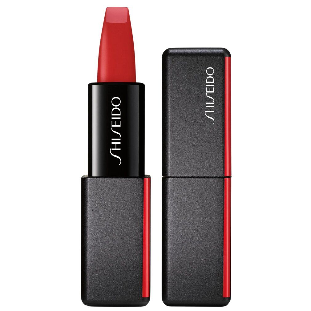 Rossetto rosso aperto. Astuccio nero con striscia rossa e scritta. Marchio Shiseido visibile.