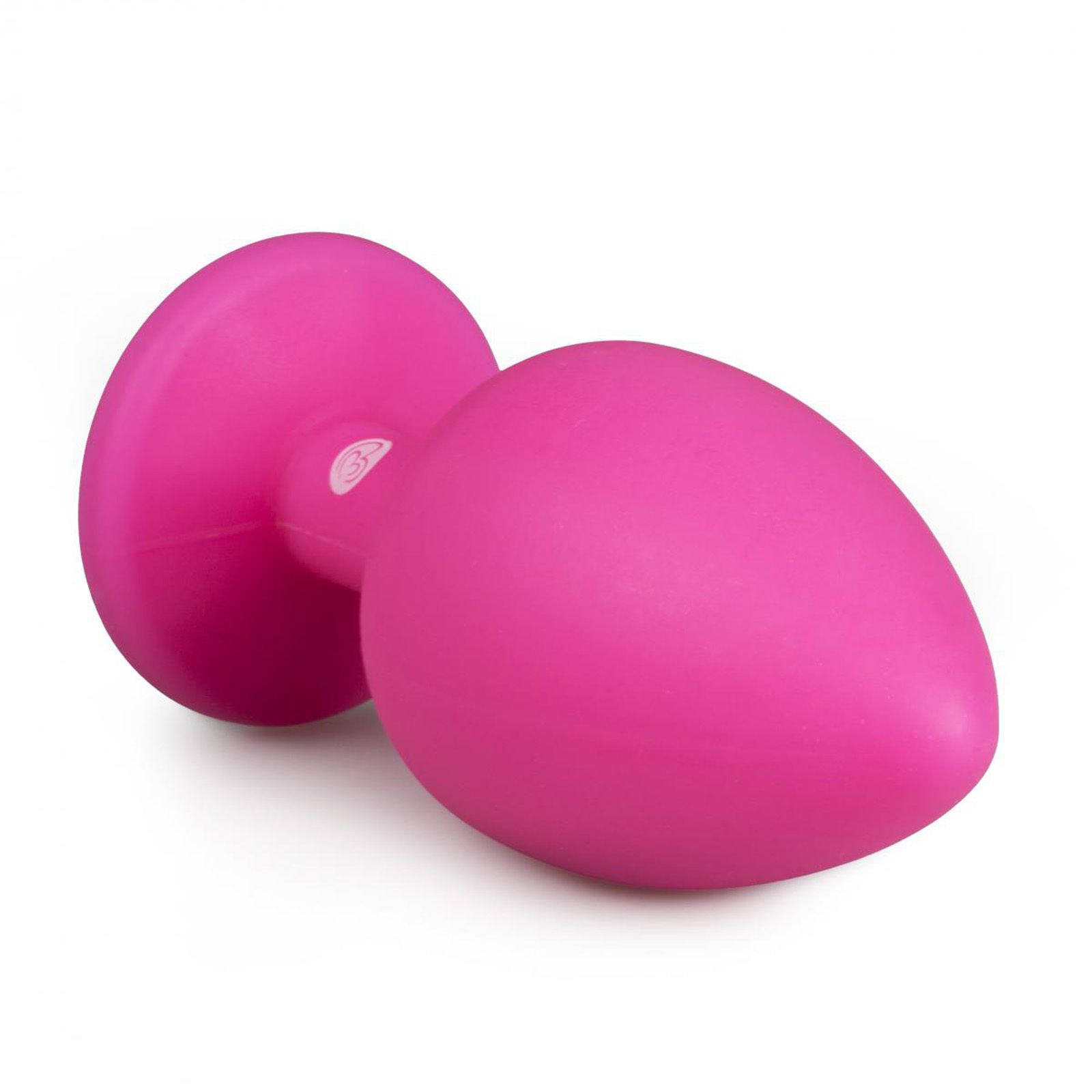 Plug anale rosa in silicone. Forma conica, base rotonda. Vista laterale.