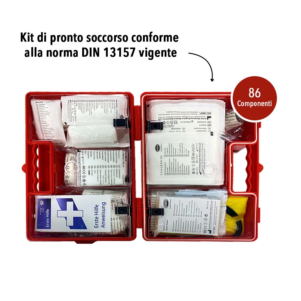 Scatola di pronto soccorso rossa aperta con 86 pezzi. Contenuto visibile.
