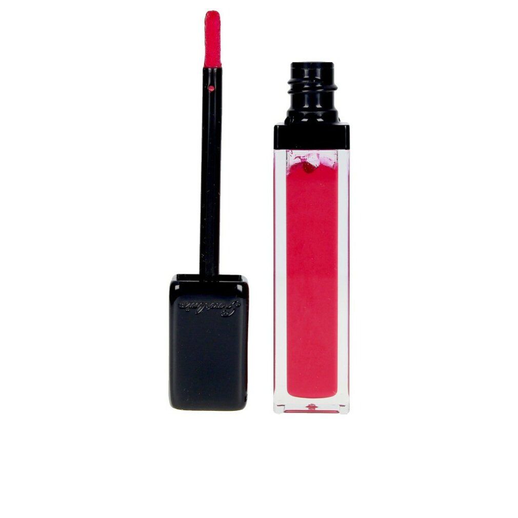 Applicatore e contenitore rossetto. Tappo nero, contenitore trasparente con liquido rosso. Applicatore con punta rossa.