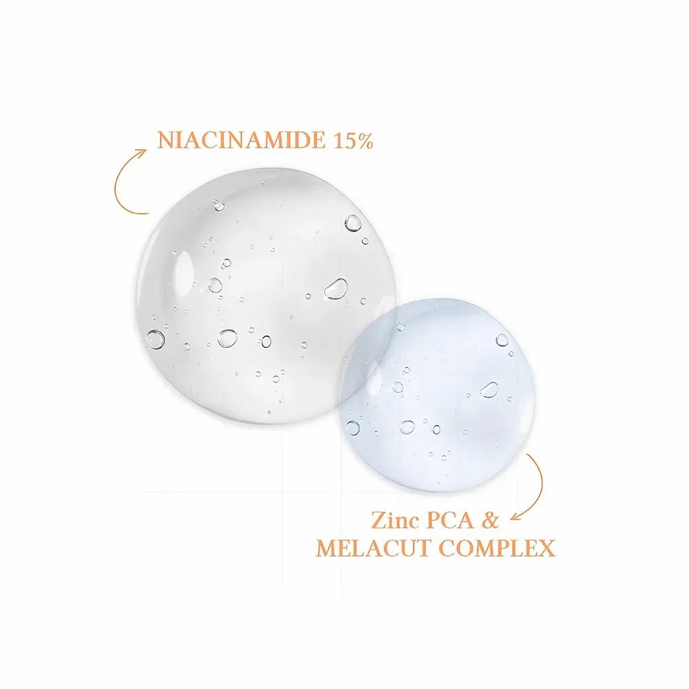 Due gocce di siero trasparente con le scritte: "Niacinamide 15%" e "Zinc PCA & MELACUT COMPLEX".