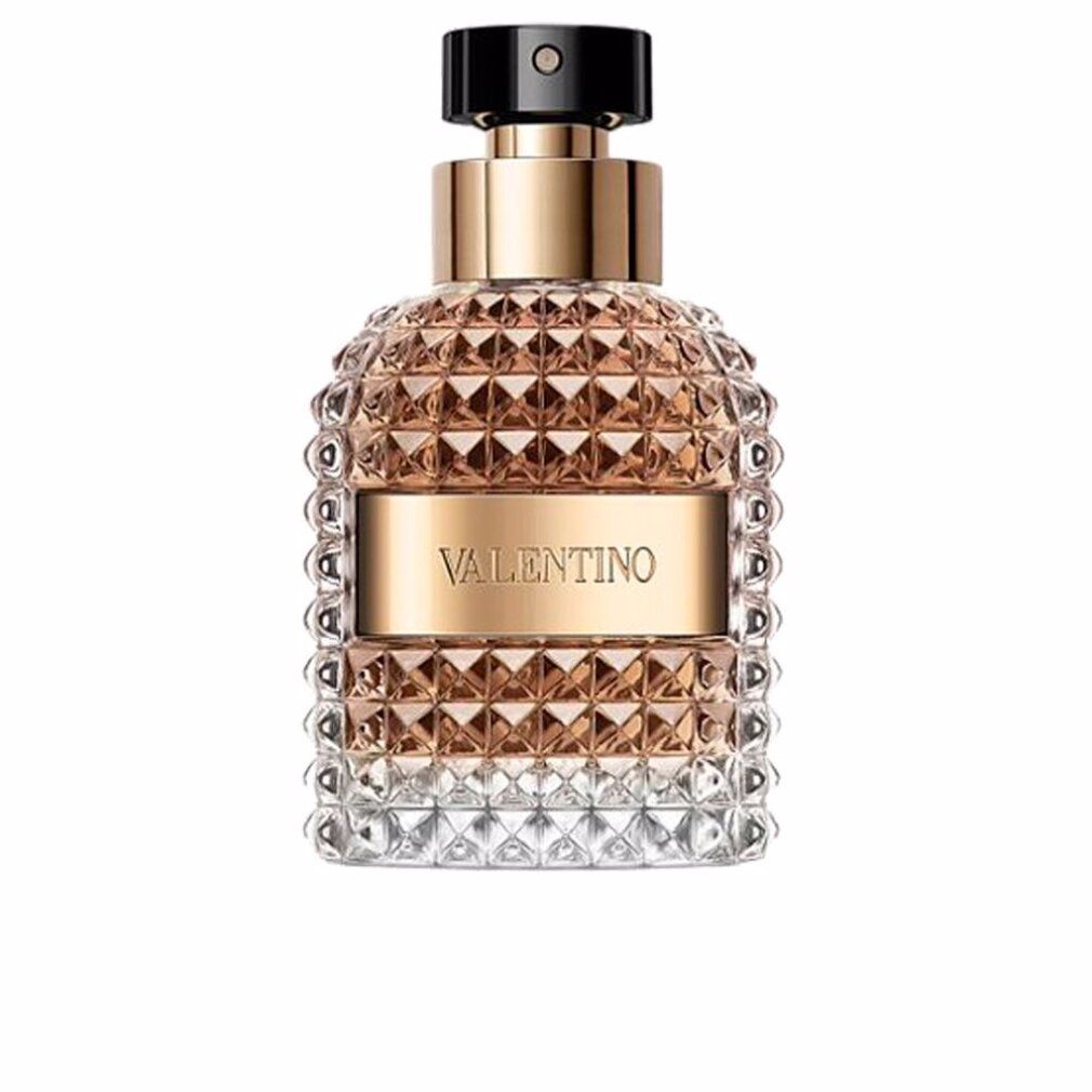 Valentino Uomo Eau de Toilette. Flacone con tappo dorato ed etichetta. Flacone in vetro goffrato.