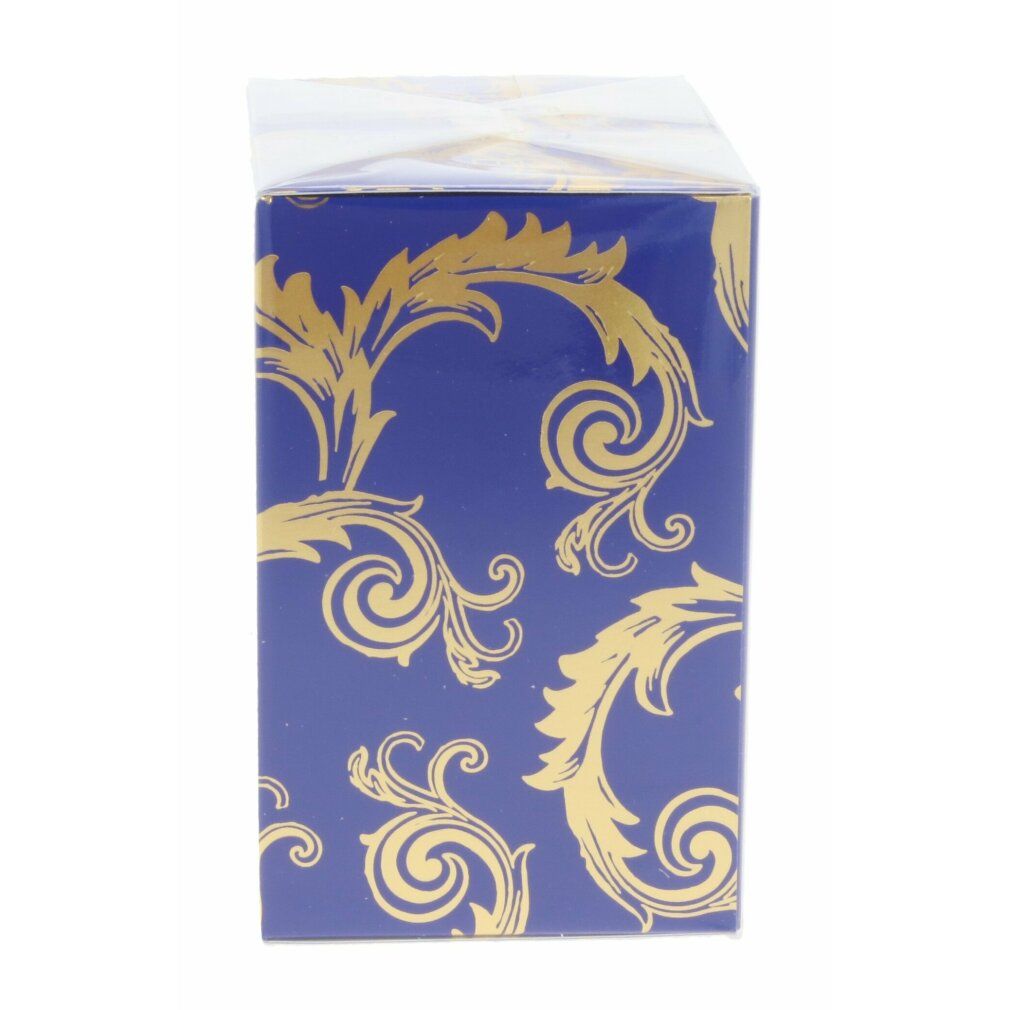 Confezione blu con motivo dorato. Forma rettangolare. Pellicola trasparente che avvolge la confezione.