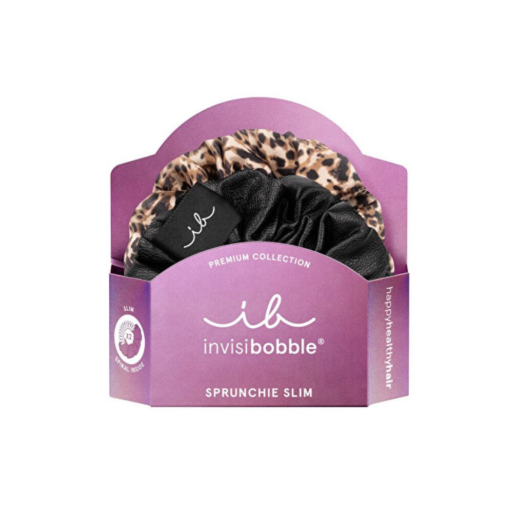 Due elastici per capelli in confezione. Uno nero e uno leopardato. Marchio: Invisibobble. Scritta: Sprunchie Slim.