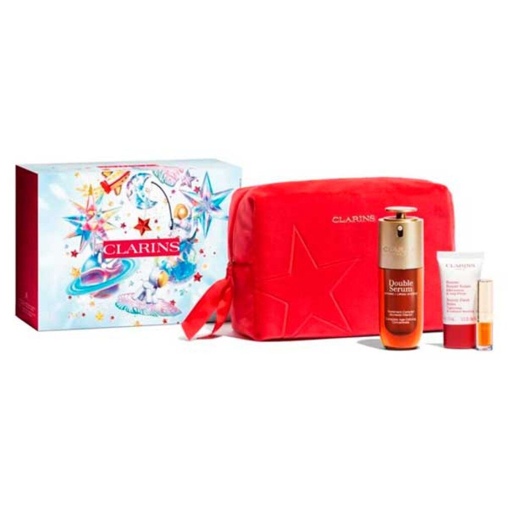 Set regalo Clarins. Siero, crema, pochette rossa. Scritta "Double Serum Collection". Decorazioni a stella.