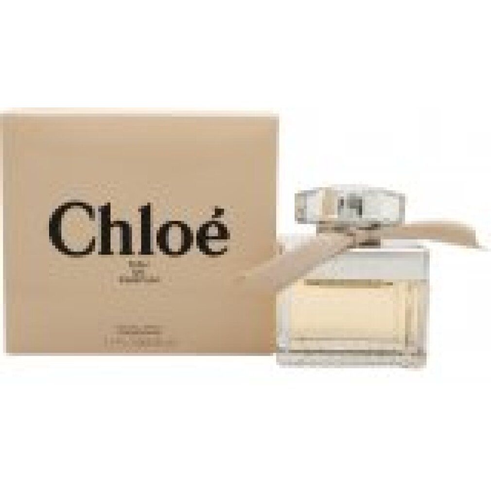 Flacone Chloé Eau de Parfum con fiocco e scatola. Scritta: Chloé, Eau de Parfum, 1.7 fl oz 50 ml.