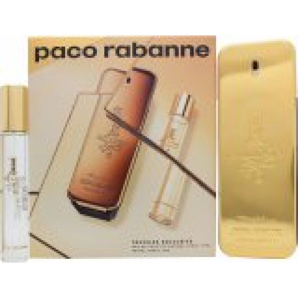 Flacone dorato e vaporizzatore in miniatura. Scritta: Paco Rabanne, 1 Million. Sulla confezione: Traveler Exclusive.