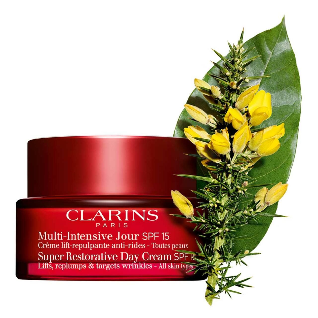 Vaso rosso Clarins Multi-Intensive Jour SPF 15. Testo. Fiori gialli e foglia verde.