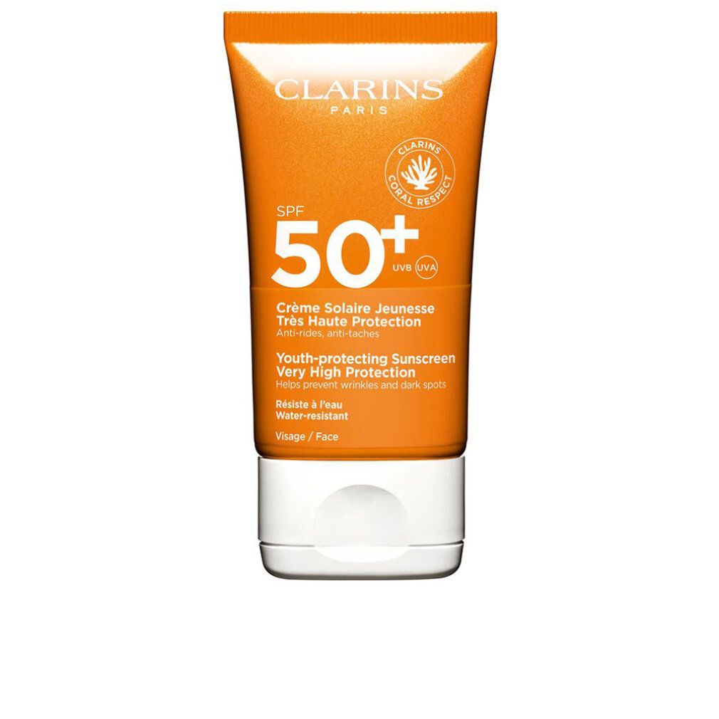 Tubo arancione e bianco. Testo: Clarins Paris, SPF 50+, Crème Solaire Jeunesse, Très Haute Protection, Anti-rughe, anti-macchie.