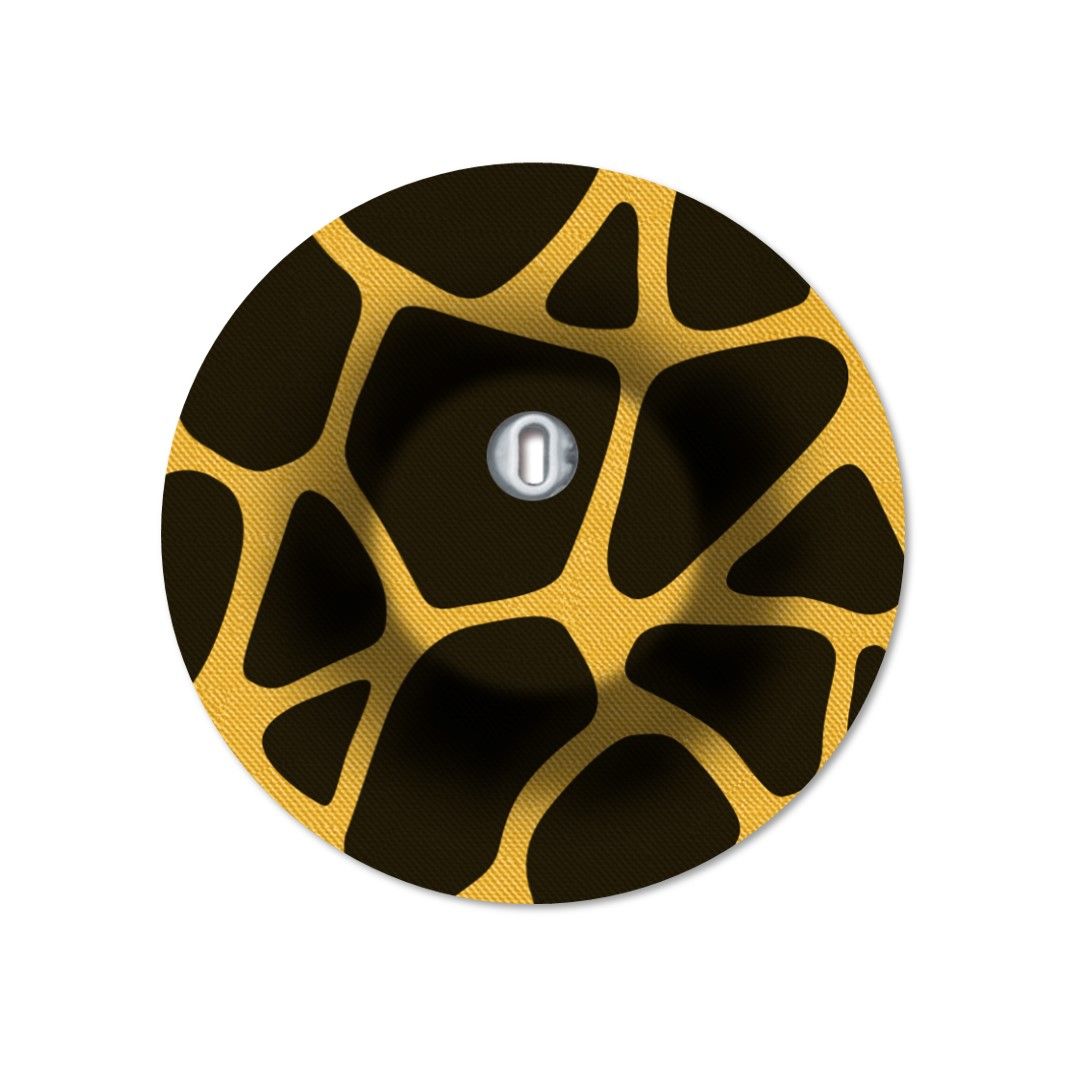 Cerotto rotondo con foro di ventilazione. Motivo giallo-marrone. Clip metallico centrale.