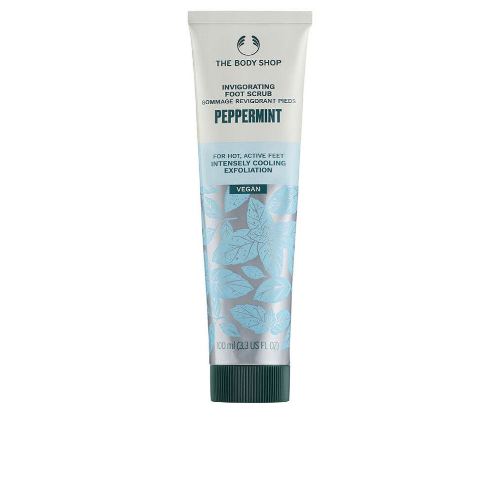 Tubo di scrub per piedi, bianco-blu, con nome e logo del prodotto. Contiene il testo: « Peppermint », « Vegan ».