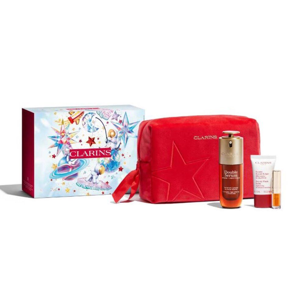 Set regalo Clarins. Siero, crema, pochette rossa. Scritta "Double Serum Collection". Decorazioni a stella.