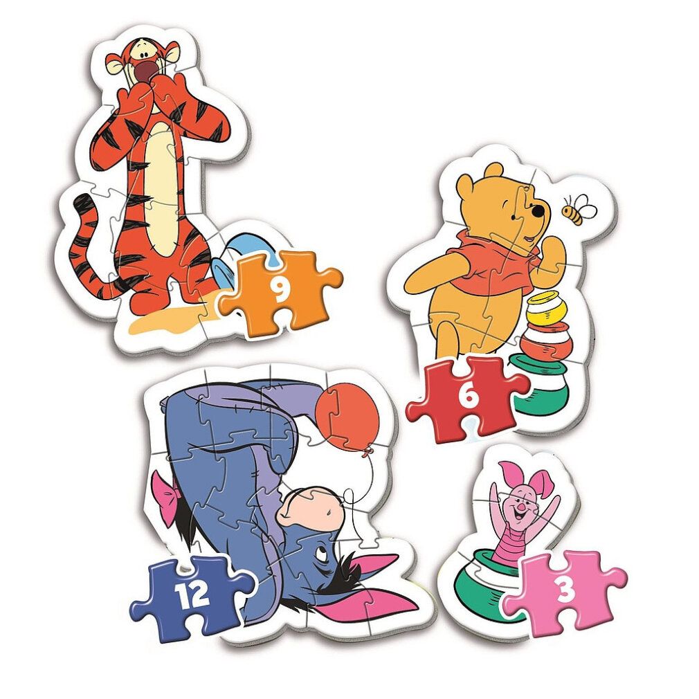 Quattro pezzi di puzzle con Winnie, Tigro, Pimpi e Ih-Oh. I pezzi sono di forme e colori diversi.