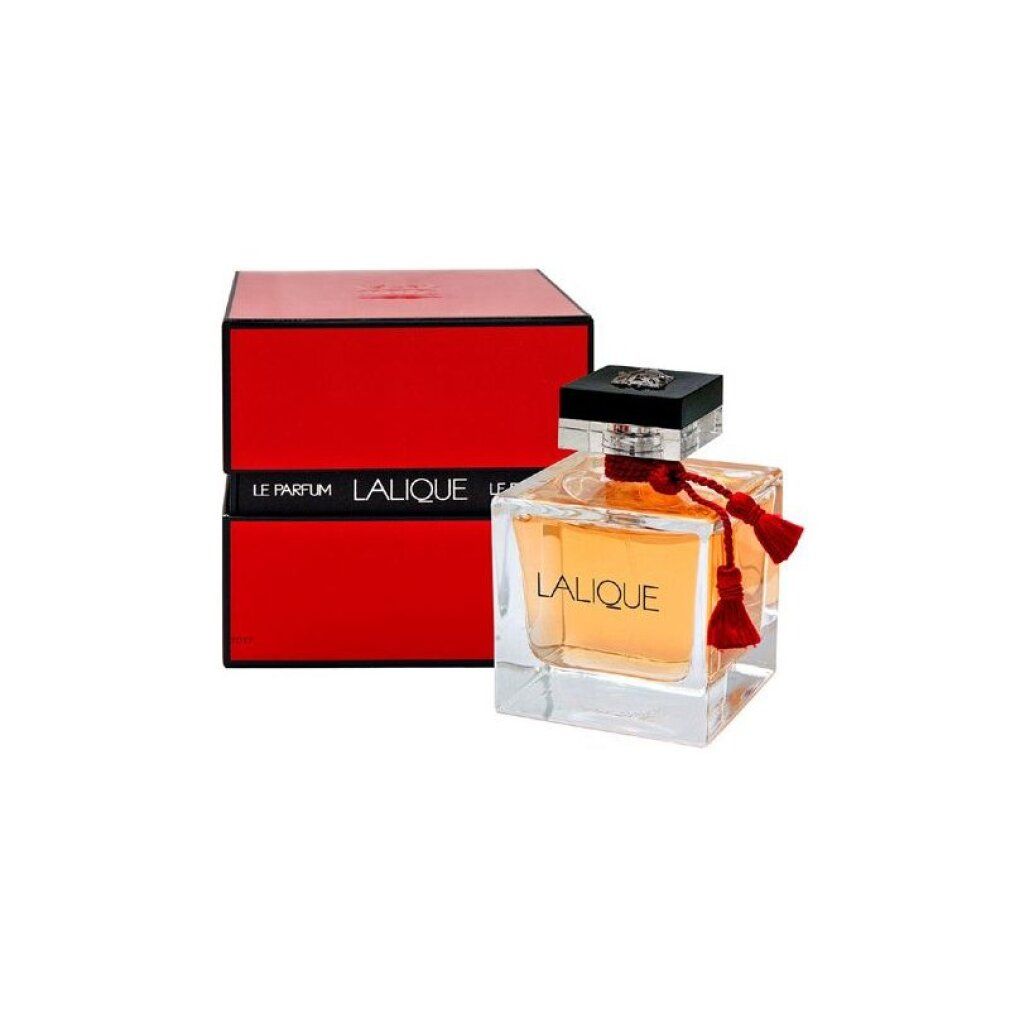 Scatola rossa accanto a flacone in vetro. Flacone con liquido ambrato, tappo nero, nappa rossa. Scritta: LALIQUE LE PARFUM.