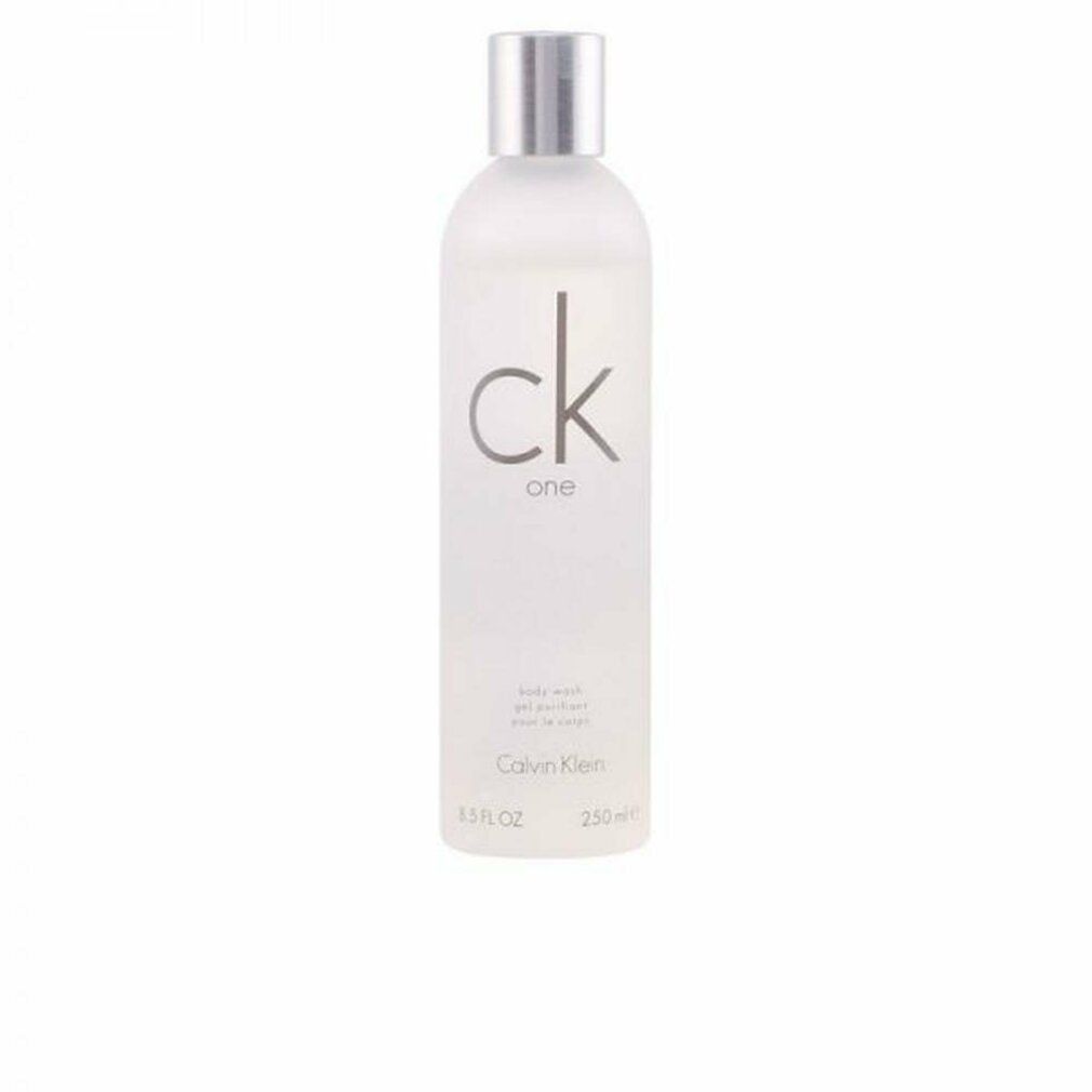 Flacone di bagnoschiuma con tappo argentato. Scritta "ck one" e "Calvin Klein".