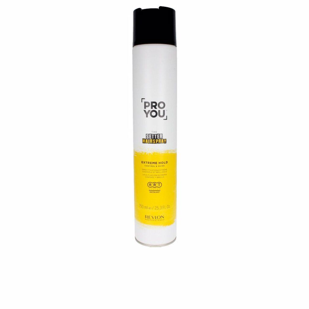 Bomboletta spray bianca e nera. Etichetta gialla con testo: PRO YOU, THE SETTER HAIRSPRAY, EXTREME HOLD. Marchio: Revlon.