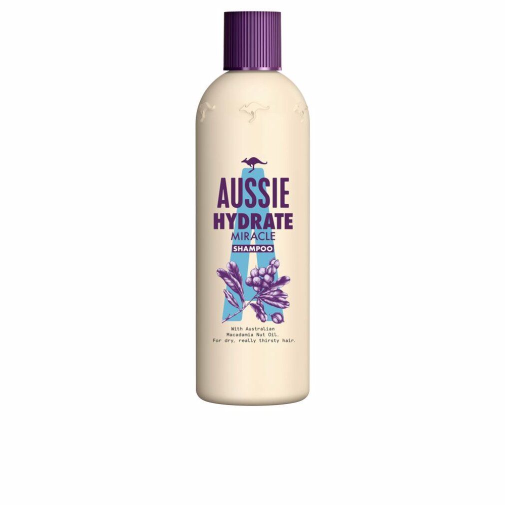 Flacone di shampoo beige con tappo viola. Scritta: Aussie Hydrate Miracle Shampoo. Con olio di noci di macadamia australiane.