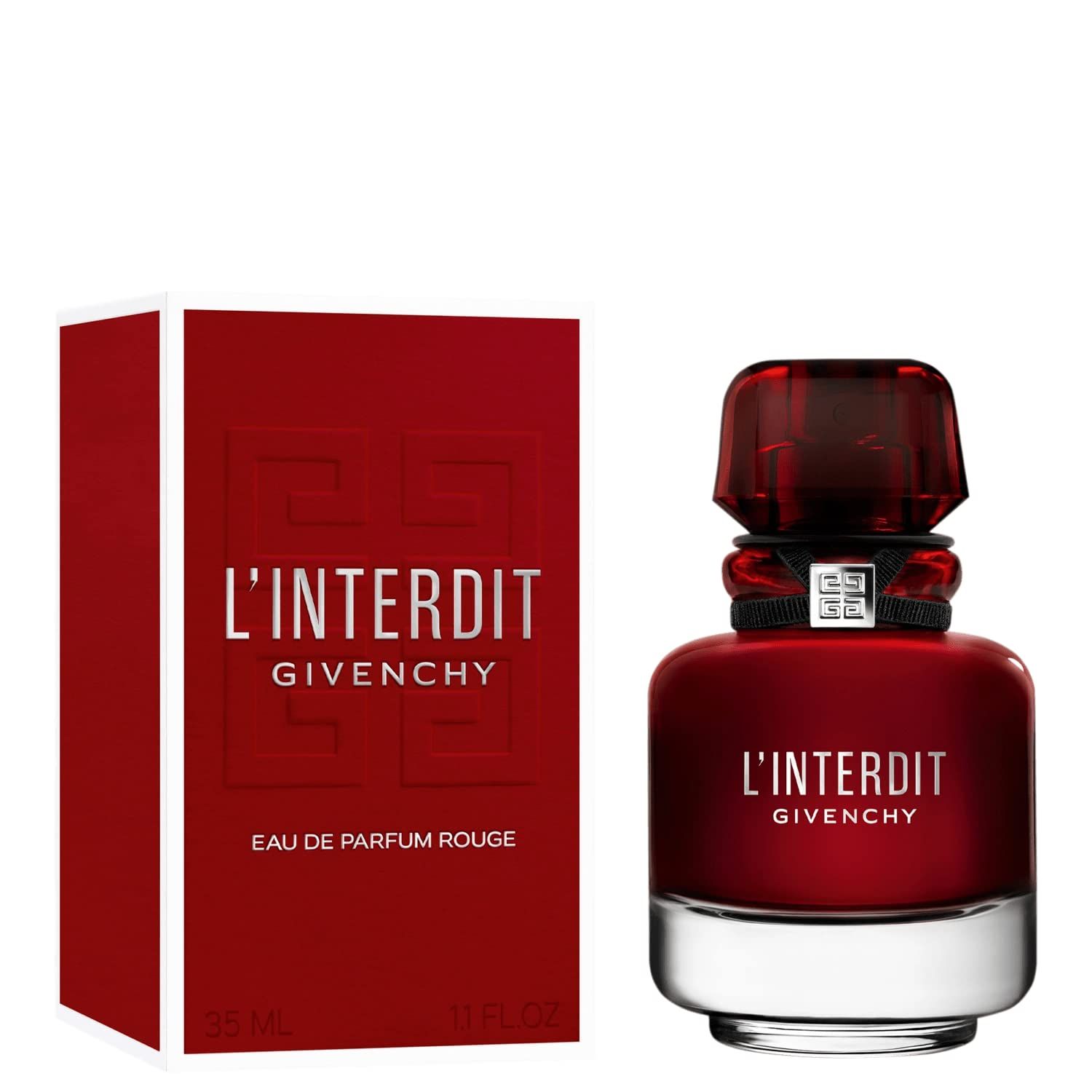 Flacone e scatola di profumo rossi. Flacone con nastro nero e tappo argentato. Scritta: L'Interdit Givenchy.