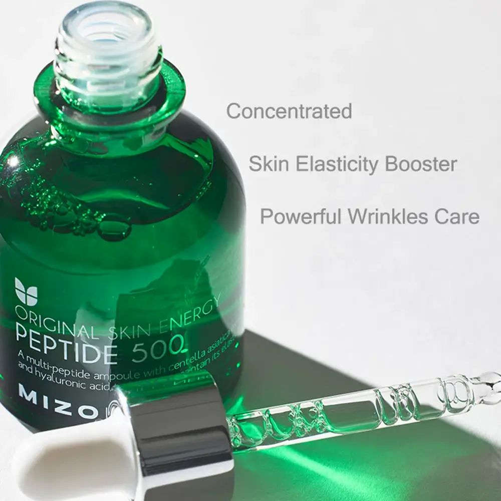 Flacone di siero verde con pipetta. Scritta: ORIGINAL SKIN ENERGY PEPTIDE 500. Marchio: MIZON. Testo: Concentrated, Skin Elasticity Booster, Powerful Wrinkles Care.