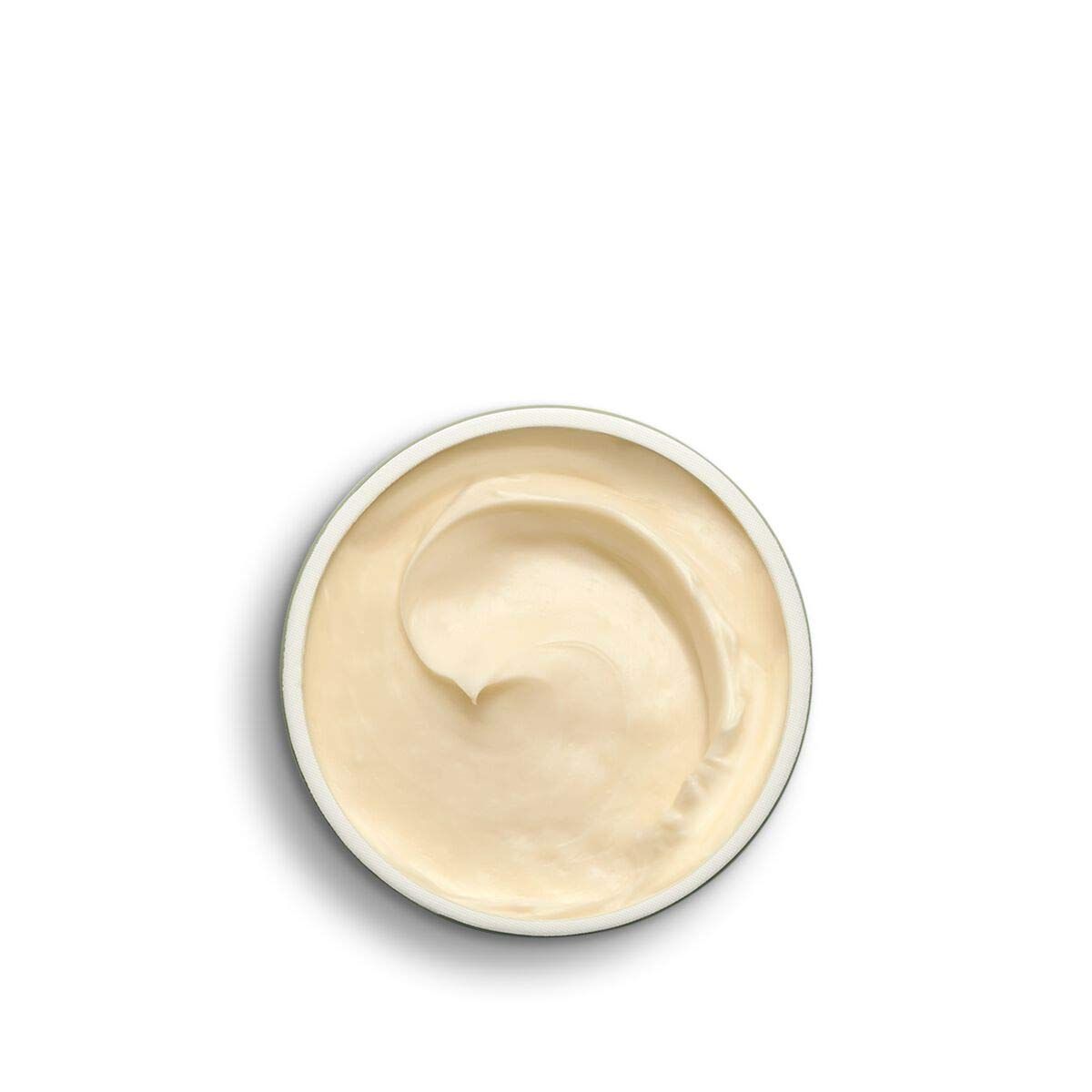 Crema in un contenitore rotondo bianco. La crema è giallo chiaro e ha una superficie ondulata.