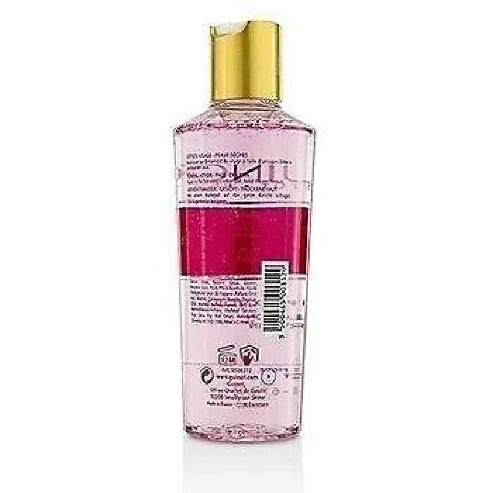 Retro della lozione tonica Guinot Hydra Beauté. Liquido rosa, etichetta con testo e codice a barre. Tappo dorato.