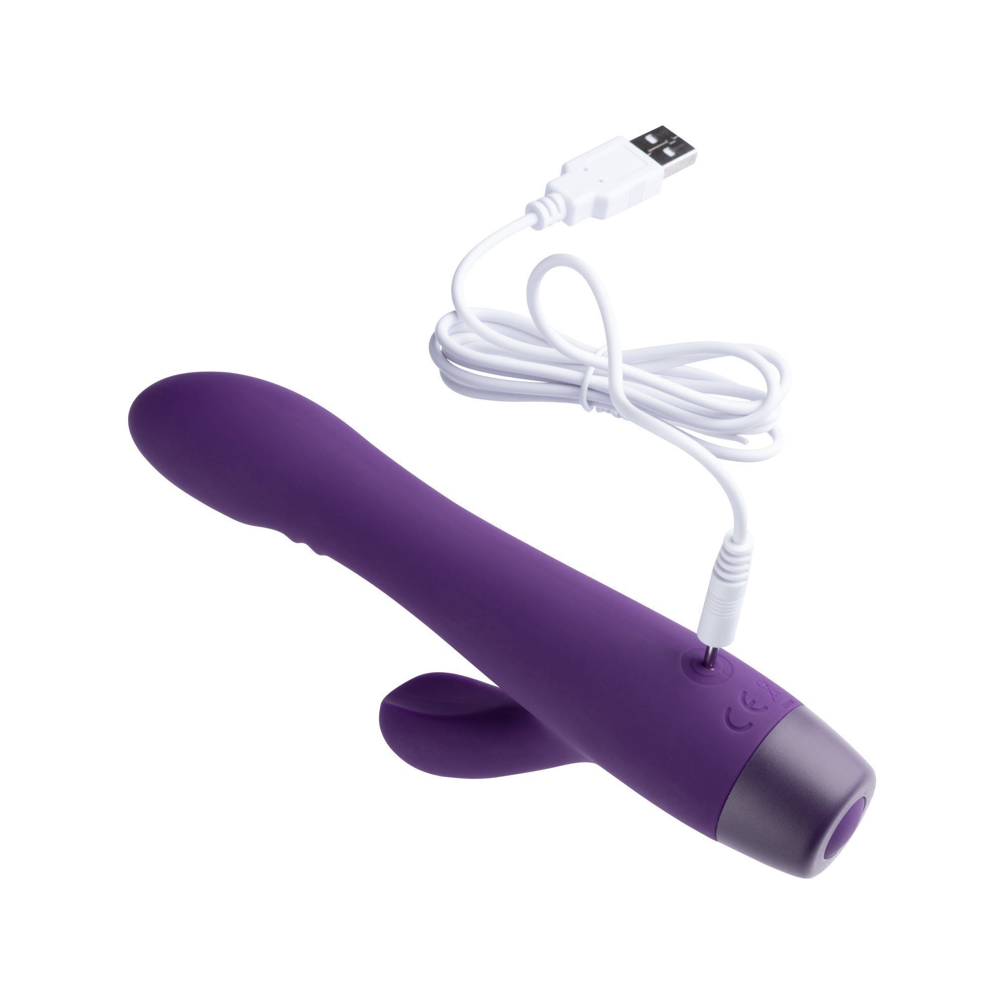 Vibratore Rabbit viola con cavo di ricarica. Cavo con connettore USB.