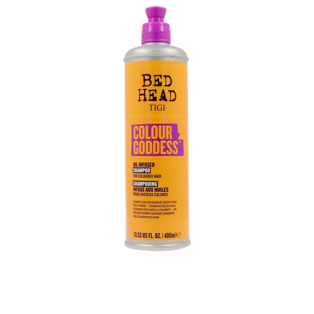 Flacone cilindrico con pompa viola. Scritta: Bed Head Tigi Colour Goddess Shampoo. Sfondo arancione.