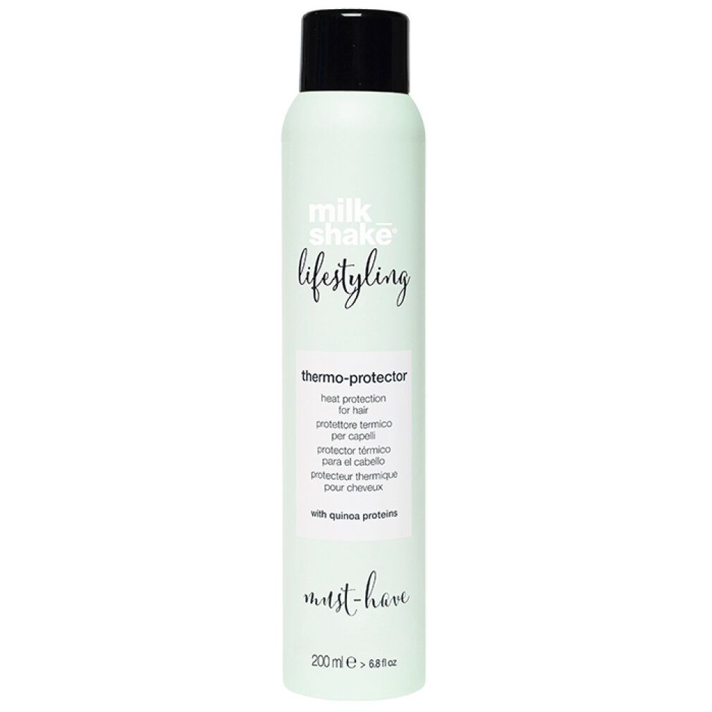 Flacone spray verde chiaro con tappo nero. Scritta: Milk_shake, Lifestyling, Thermo-Protector. Con proteine di quinoa. Volume: 200 ml.