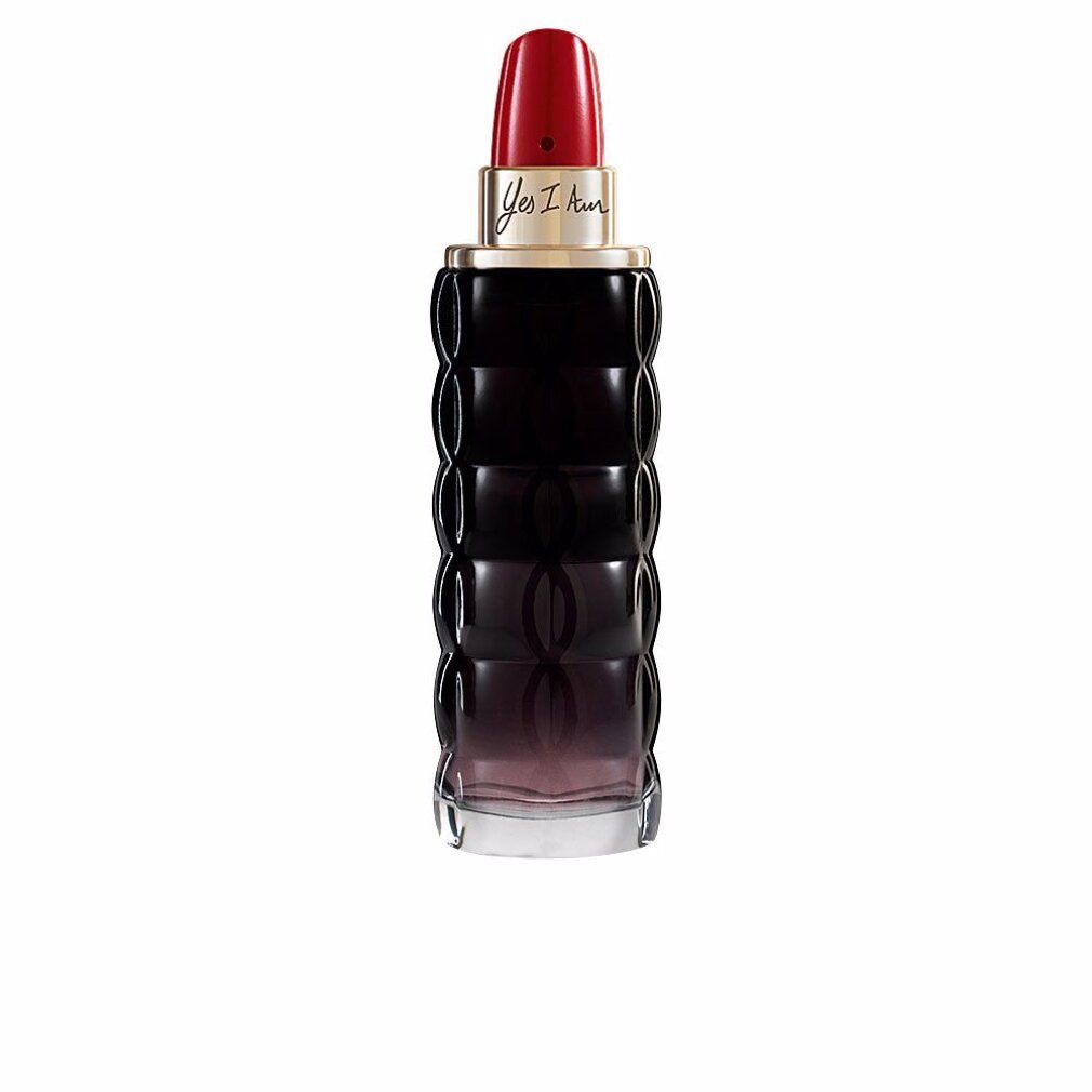 Flacone di profumo con tappo rosso, sfumatura nera. Scritta "Yes I Am".