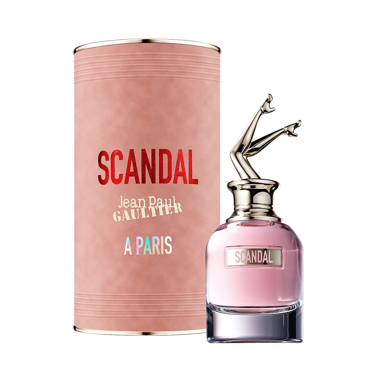 Flacone di profumo e confezione cilindrica. Flacone rosa con gambe dorate. Scritta "SCANDAL". Confezione rosa.