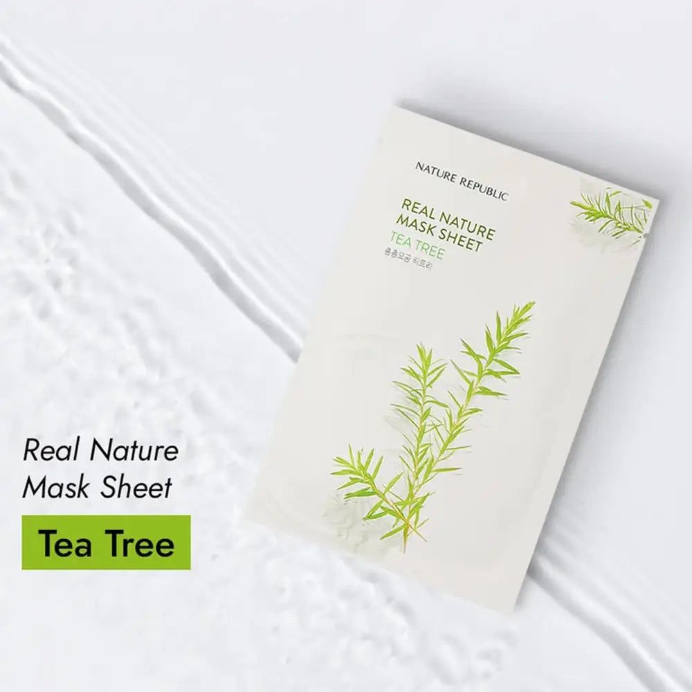 Confezione di maschera per il viso. Marchio NATURE REPUBLIC. Testo: Real Nature Mask Sheet Tea Tree. Illustrazione di foglie di tè.